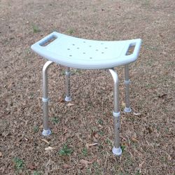 Adjustable shower bench