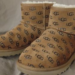 assic Mini Embossed Logo Boots. 