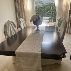 high-quality dining suite (with Dinning Chairs) -that makes a stunning statement piece. This set is in great condition.