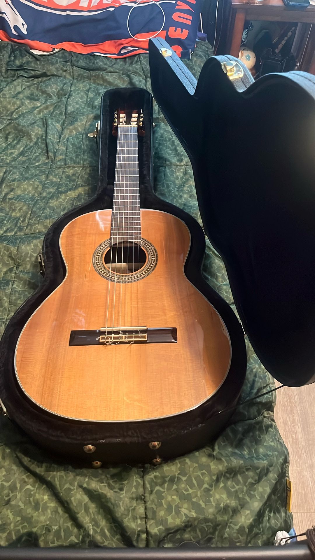 Old Used School Band Acoustic Guitar Along With The Casing For It 