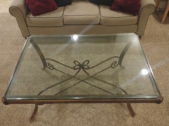 Beautiful metal glass, very heavy, very sturdy coffee/cocktail table.