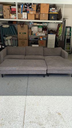 Living Spaces couch with ottoman.
