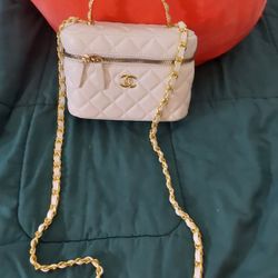 👜