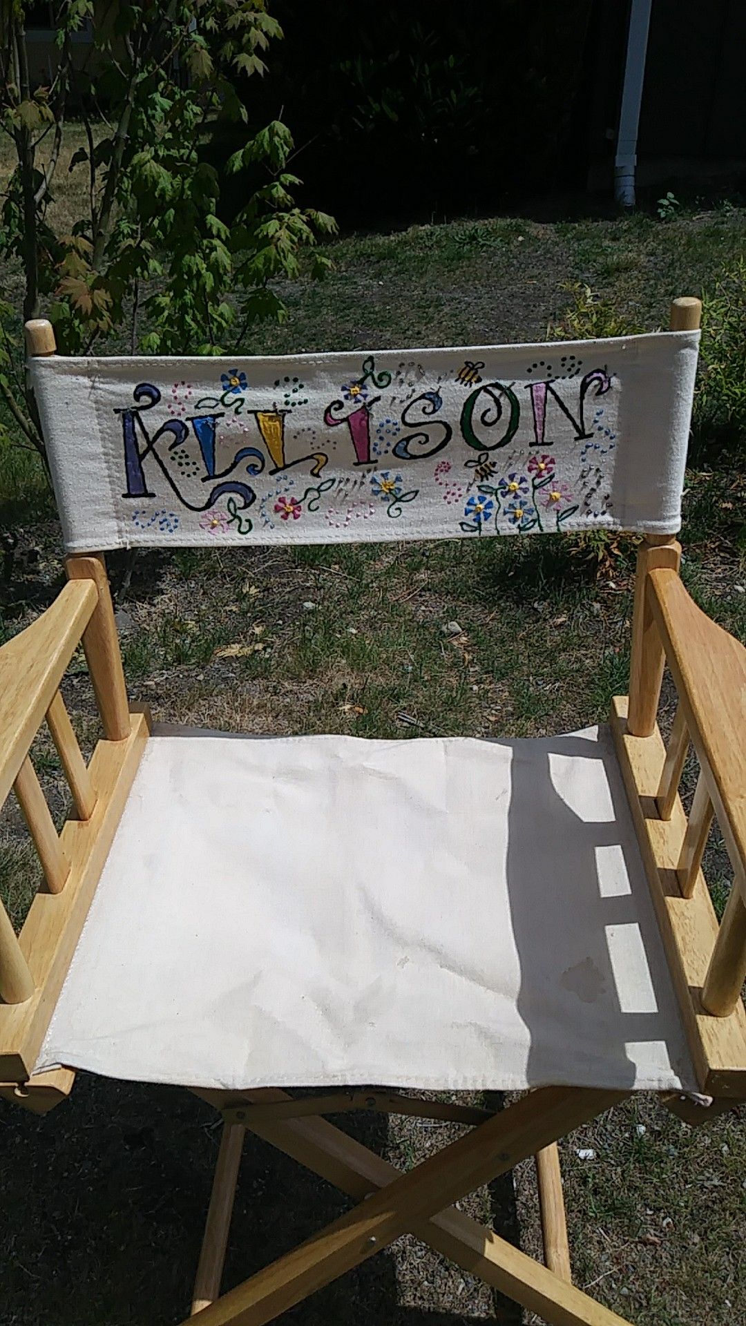 Folding director's chair (says Allison) $5 its nice wood
