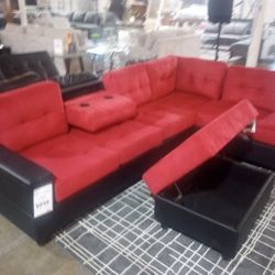 Red And Black Cupholder Sectional With Storage Ottoman Included ( Ask For Jose)