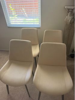 Four dining chairs