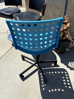 Chair like stool. Could be bar stool