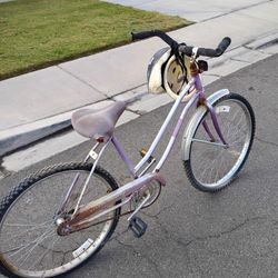Bicycle And 2 Helmets 