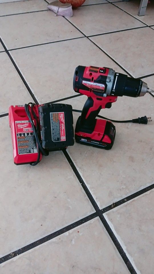 Impact brown, new and Chloe charger to battery.
