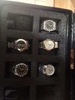 Five Invicta watches and collector box