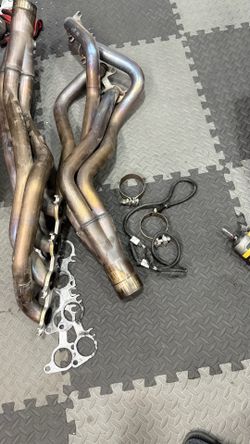 GT350 American Racing long tube headers and JLT intake.