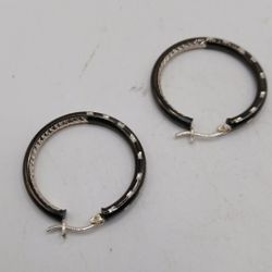 Glossy Black Diamond Cut Hoop Earrings in Sterling SilverCrafted in .925
