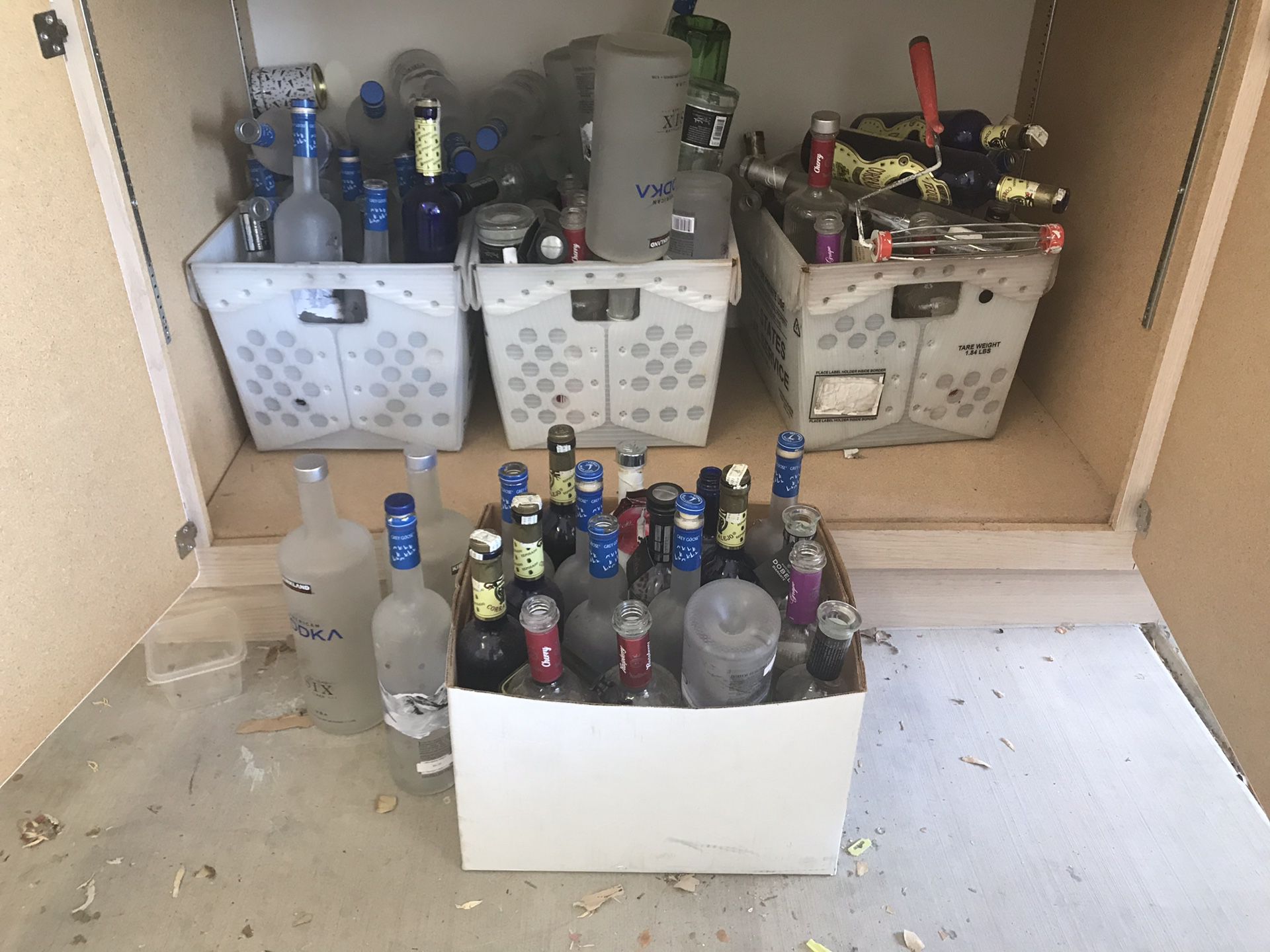 Assorted empty alcohol bottles