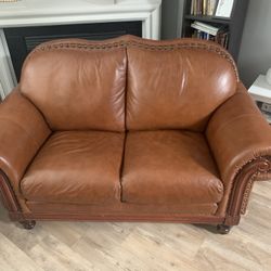 Leather Couch w/wood nail head trim 