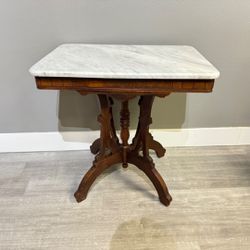 Antique Eastlake Victorian walnut marble top lamp table.