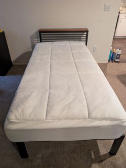 Twin bed - frame, mattress, and cover