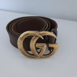 Gucci GG Marmont wide belt in brown leather with an antique brass Double G buckle. 