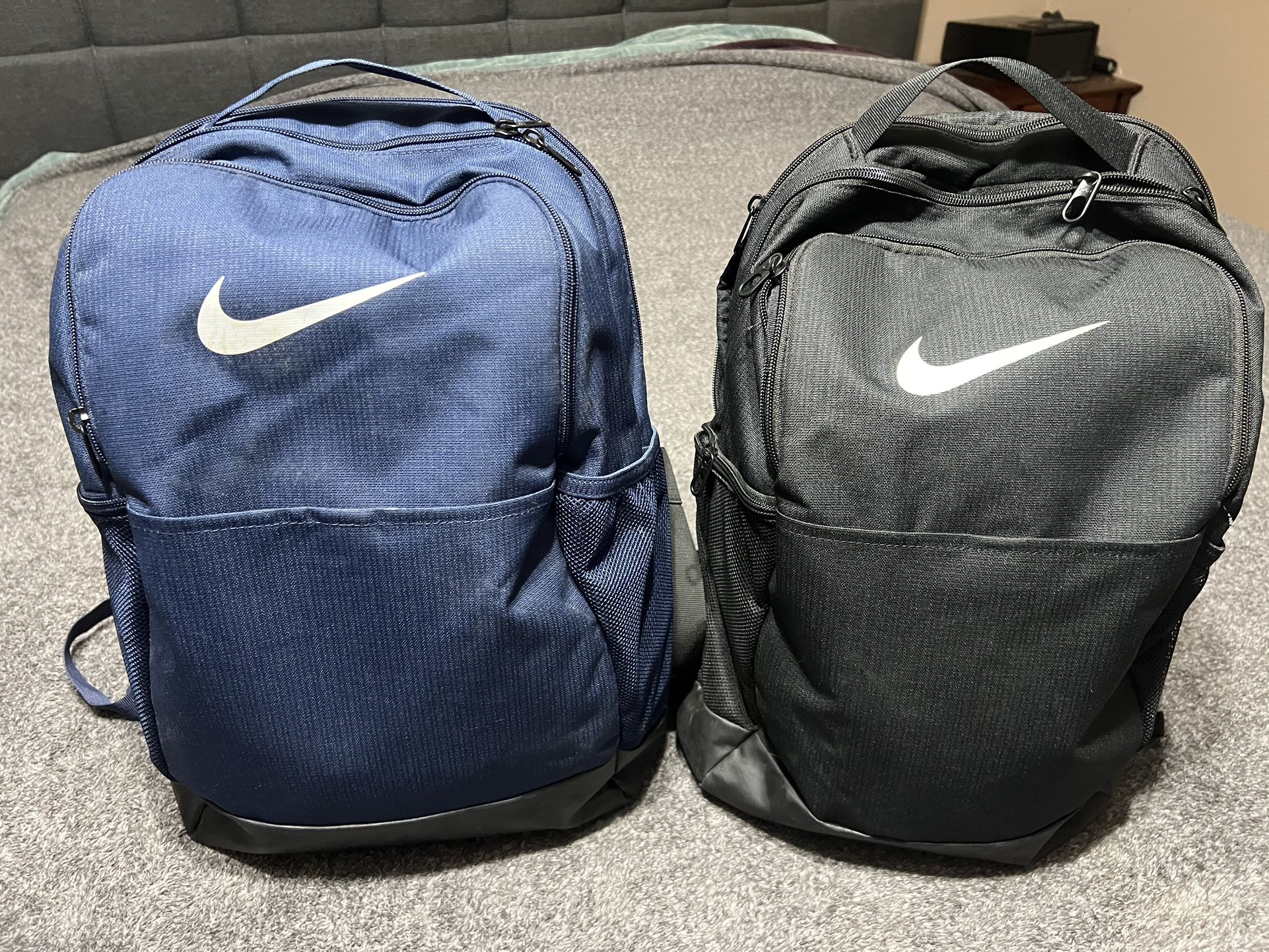 Pair Of Nike Backpacks