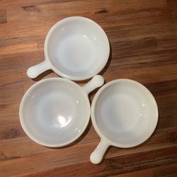 Set of three vintage Glasbake bowls with handles. Oven and microwave safe. Ideal for serving French onion soup, chili, cereal, or appetizers! In good