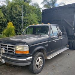 1995 Ford F350 crew cab truck with dump bed