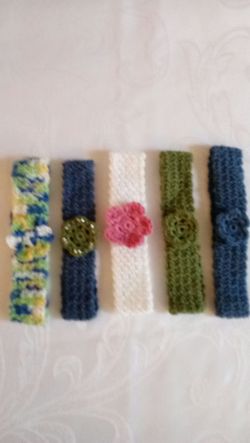 Baby girls head bands, hand crafted, made with cotton yarns, new, $1.00 each.