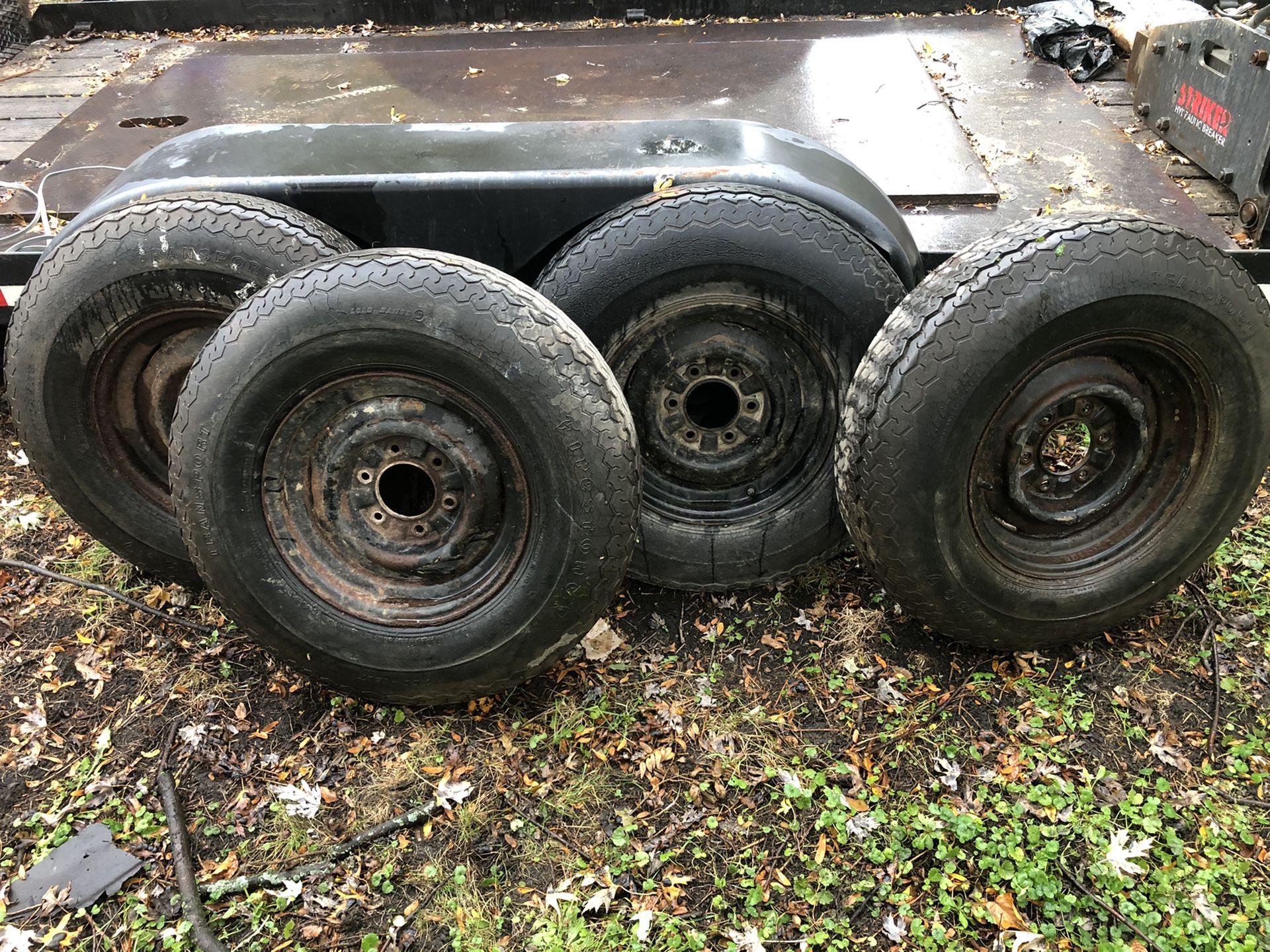 4 used trailer tires and rims. Good for the spare tire