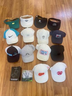 14 golf hats and accessories (phone mount, tees)