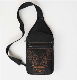 The Logo Embroidered Patch Sling Bag blends easy function with standout style