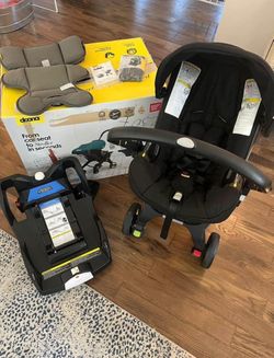 Doona Infant Car Seat Stroller with Base and complete accessories