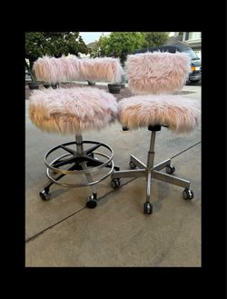 Pink fur rolling chairs