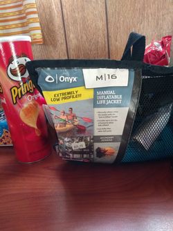 Inflatable life vest