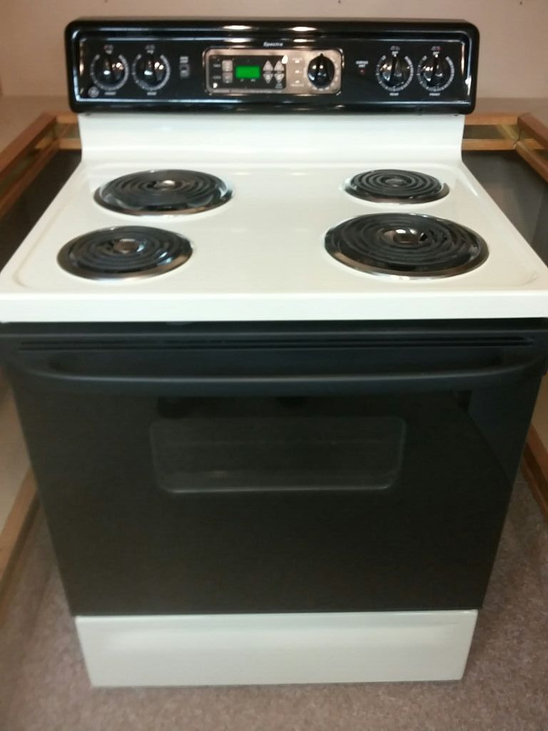 G.E. "SPECTRA" ELECTRIC STOVE / BISQUE / SELF-CLEAN OVEN / GUARANTEED!