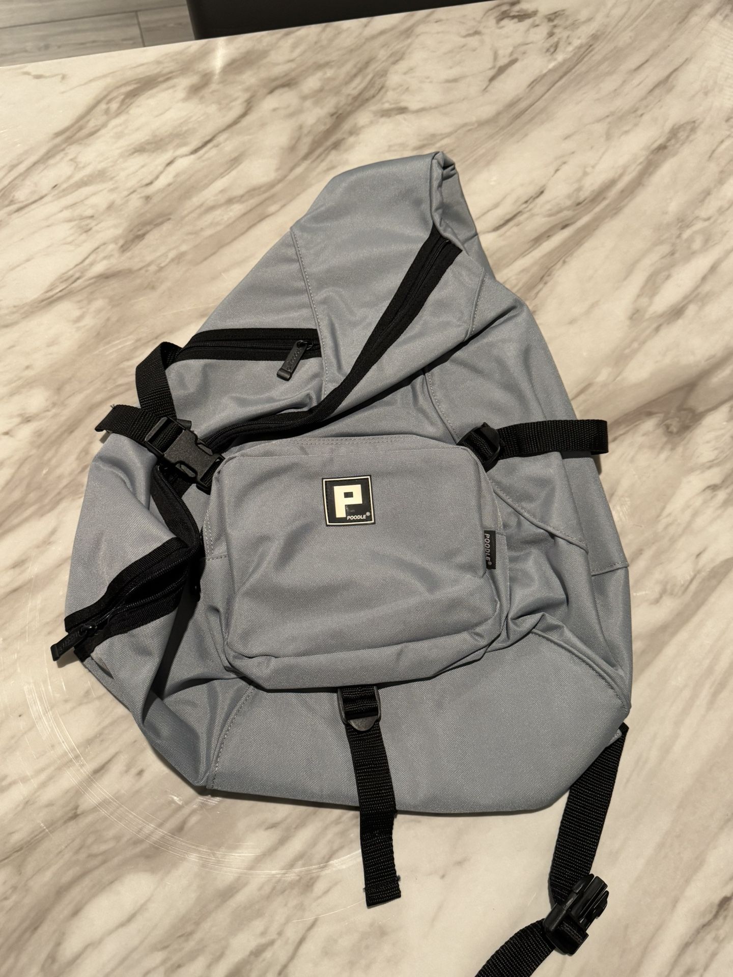 Poodle Brand Sling Backpack