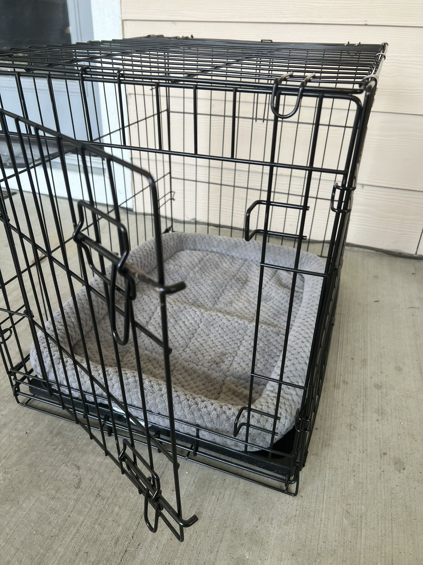 Dog Crate It’s 18in by 24in and 20 in deep