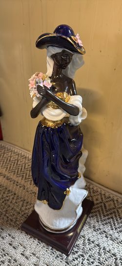 Lady In Dress Statue