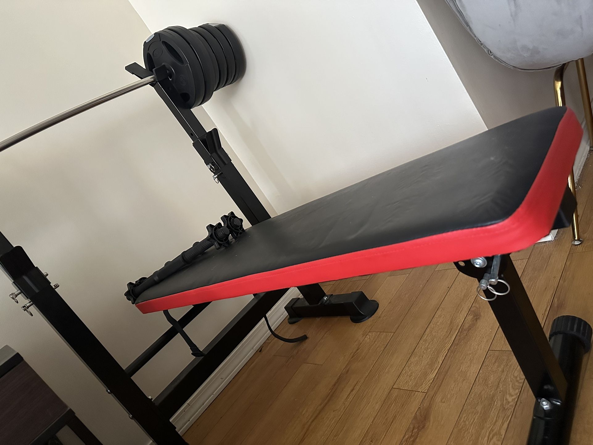 Workout Bench And Some Weights