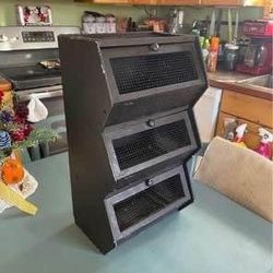 Storage. three tier bins. Wood. I used to store spices in my kitchen. I painted it black. Measurements are in the pictures cash only Everett/Melvin Av