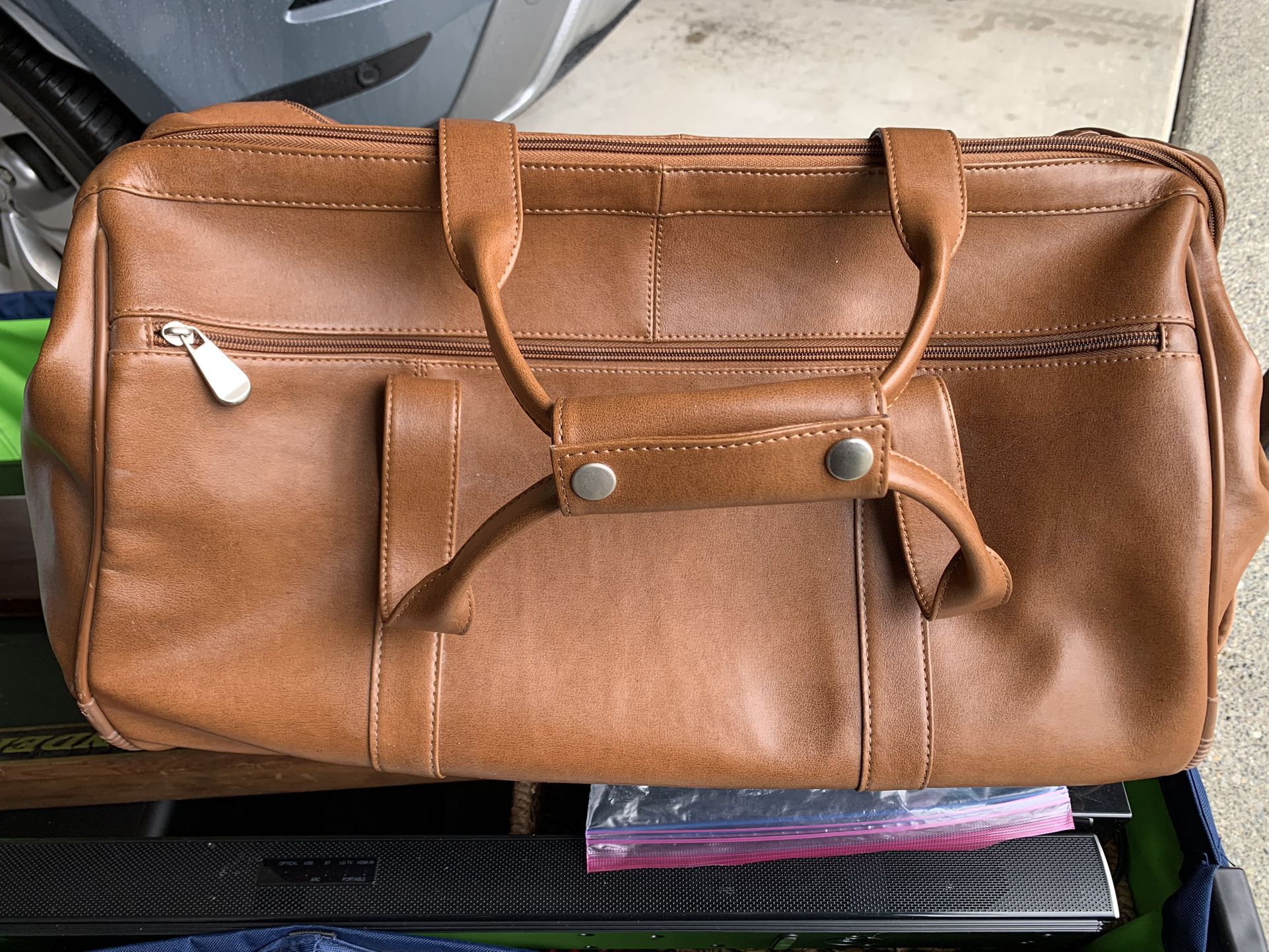 Rolling Leather Duffle Bag