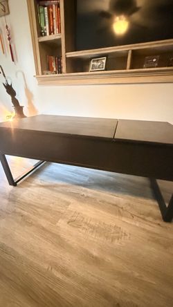 Coffee table with lift and slide