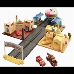 Disney And Pixar Cars On The Road Radiator Springs Tour Playset With 2 Vehicles And Light-Up Countdown, Features Lightning McQueen Racer, Mater Truck 