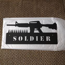 SOLDIER LASER CUT METAL SIGN.  12" X  5.5".  NEW.  PUCKUP ONLY.