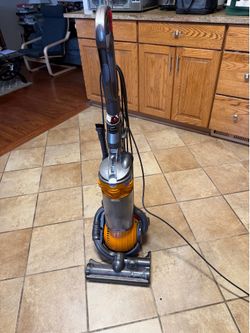Dyson bagless upright Vacuum With HEPA Filter