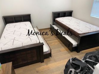 2 Twin Solid Wood Beds With Twin Trundles And Mattresses $1,360