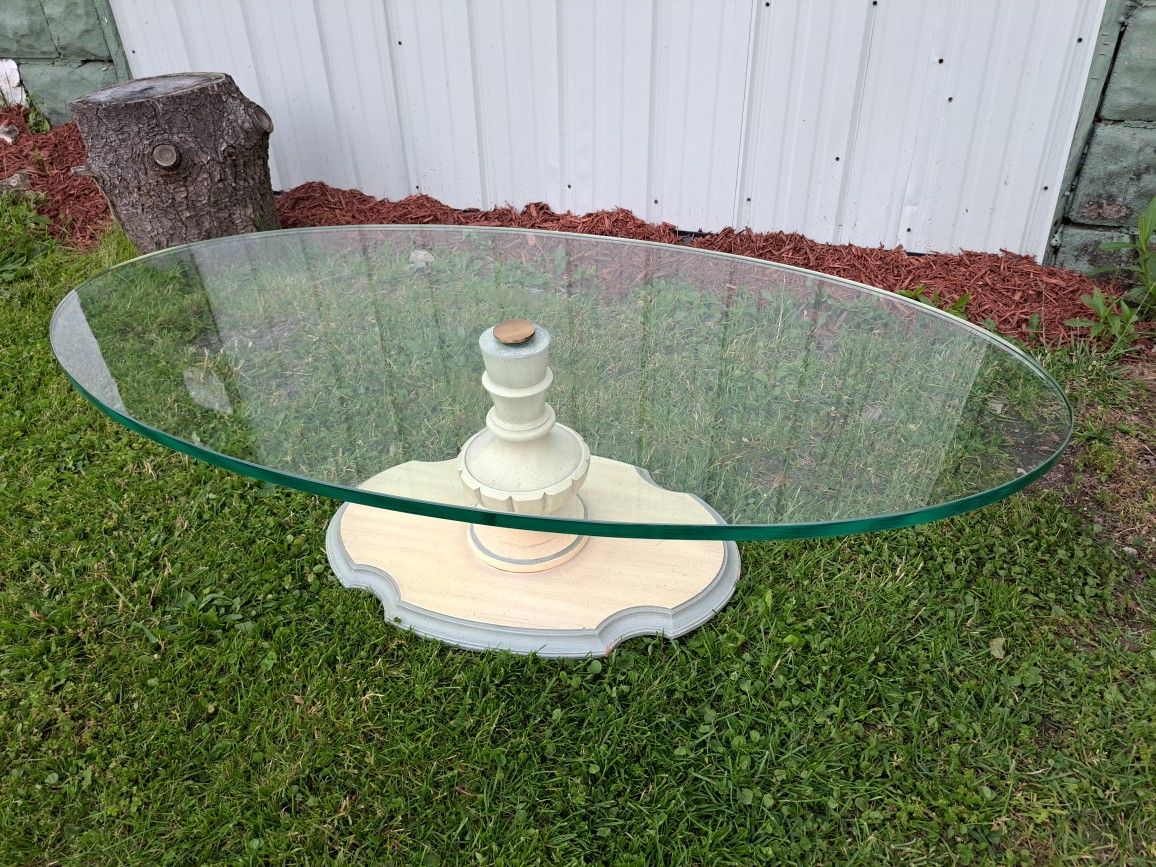 Beautiful 3/4" Glass top Coffee Table with Wood Base
Measures 4' x 2'