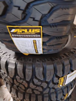 New set of tires aplus mud terrain 33 1250 20 lt