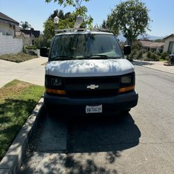 2009 CHEVY EXPRESS 1500 WITH ROOF RACK AND BUILT IN COMPARTMENTS