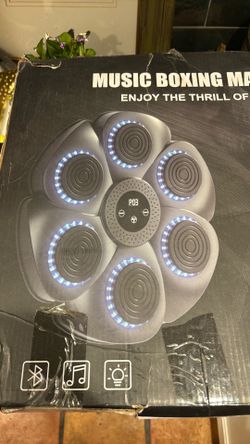 New in box, music boxing machine