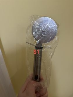 Moving Sale By August: Pizza Cutter