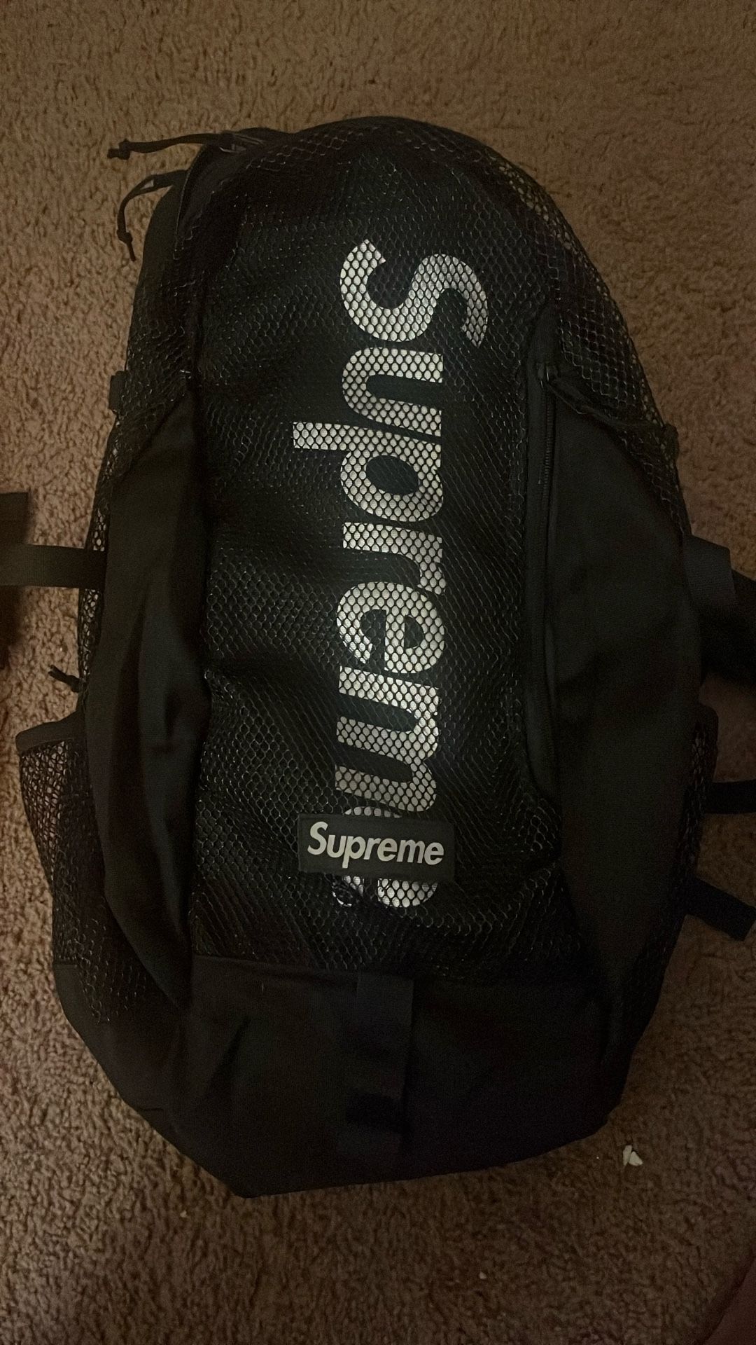 Black Supreme Backpack And Orange Moncler