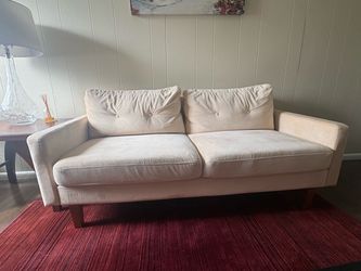 Cream love seat couch